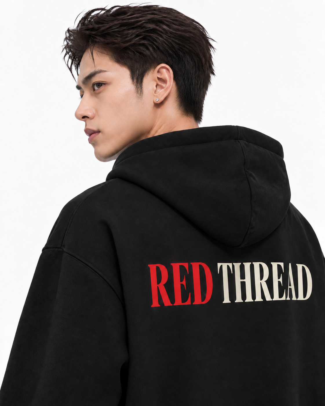 Red Thread Two Tone hoodie in black, worn by a male model