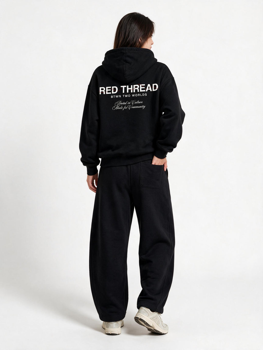 Red Thread Barrel sweatpants in black, worn by a model