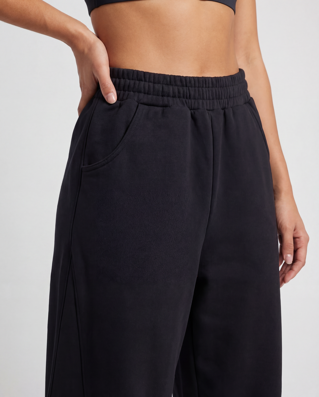 Red Thread Barrel sweatpants in black, worn by a model