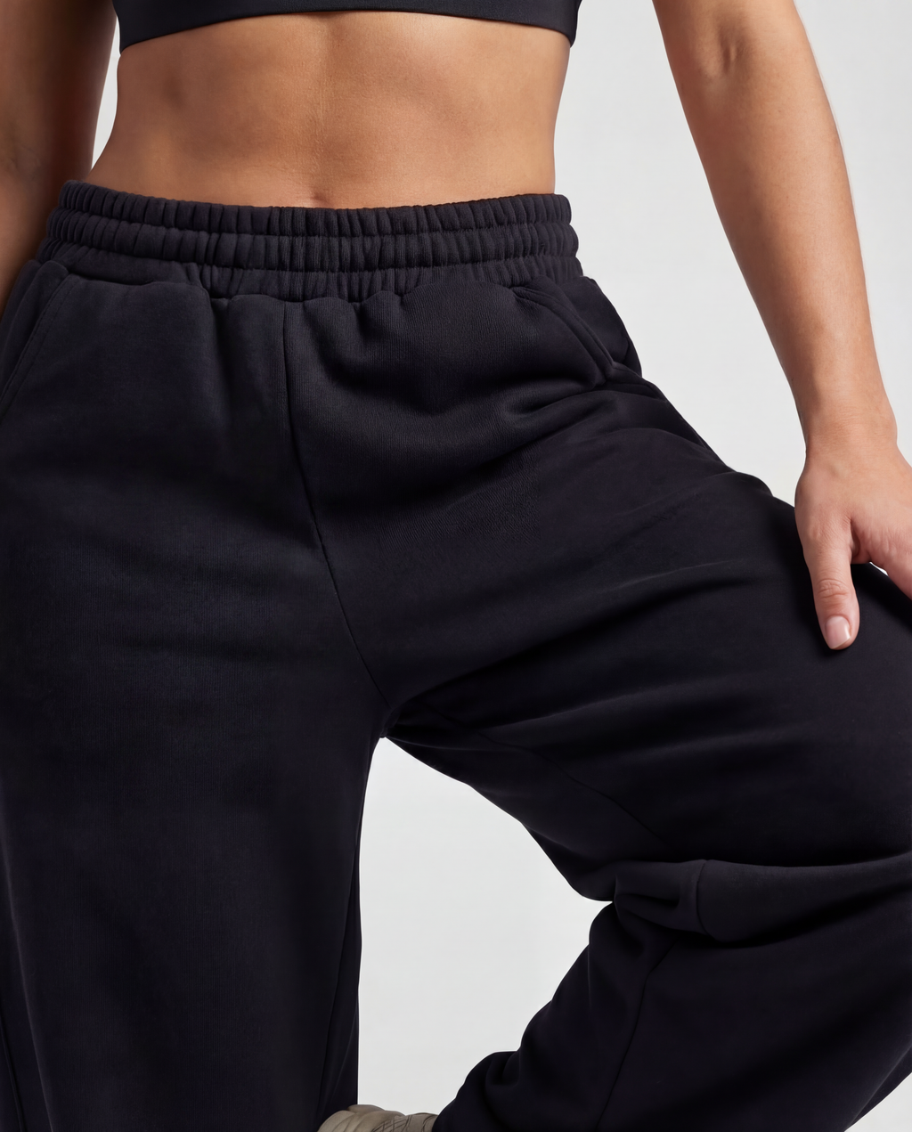 Red Thread Barrel sweatpants in black, worn by a model