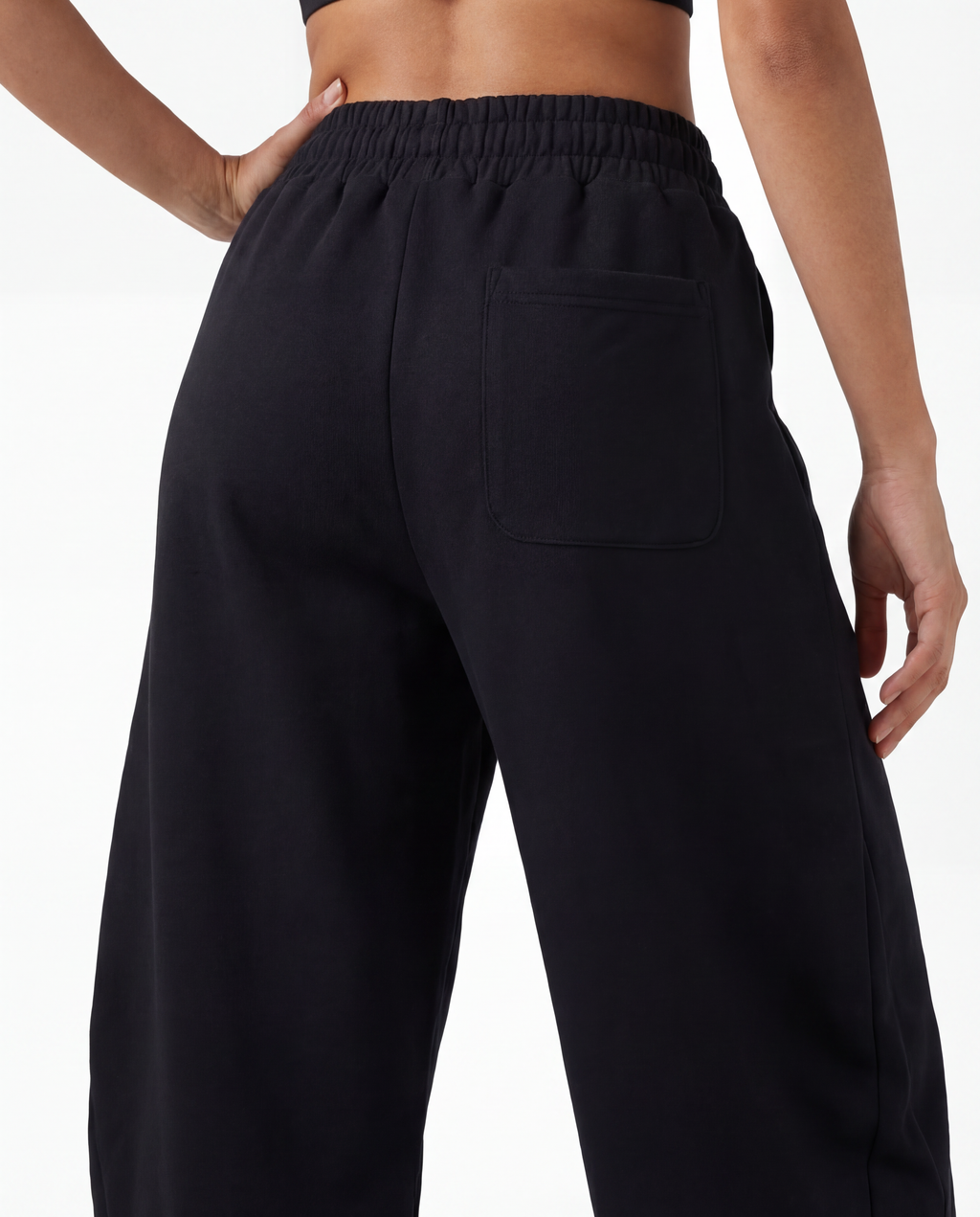 Red Thread Barrel sweatpants in black, worn by a model