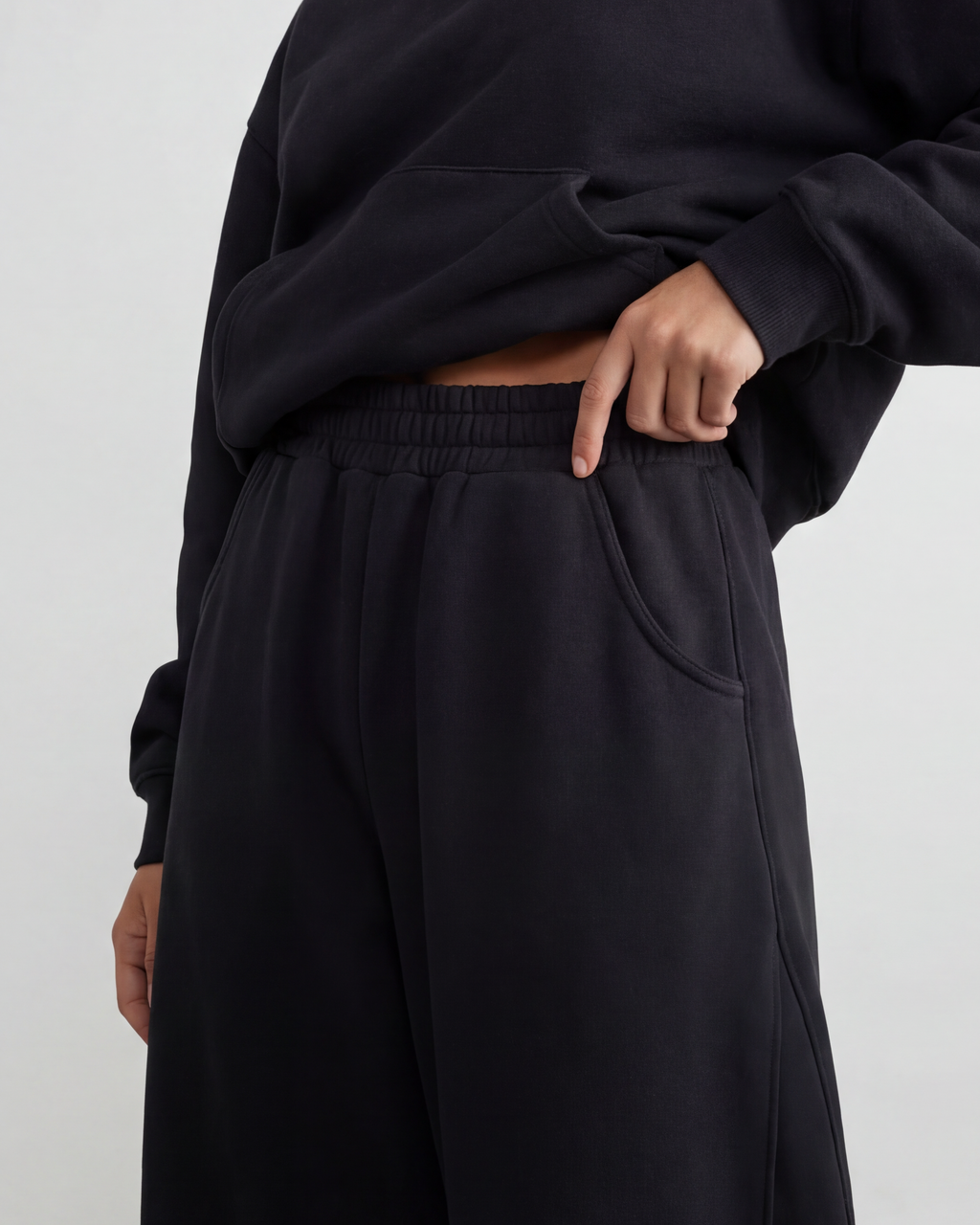 Red Thread Barrel sweatpants in black, worn by a model