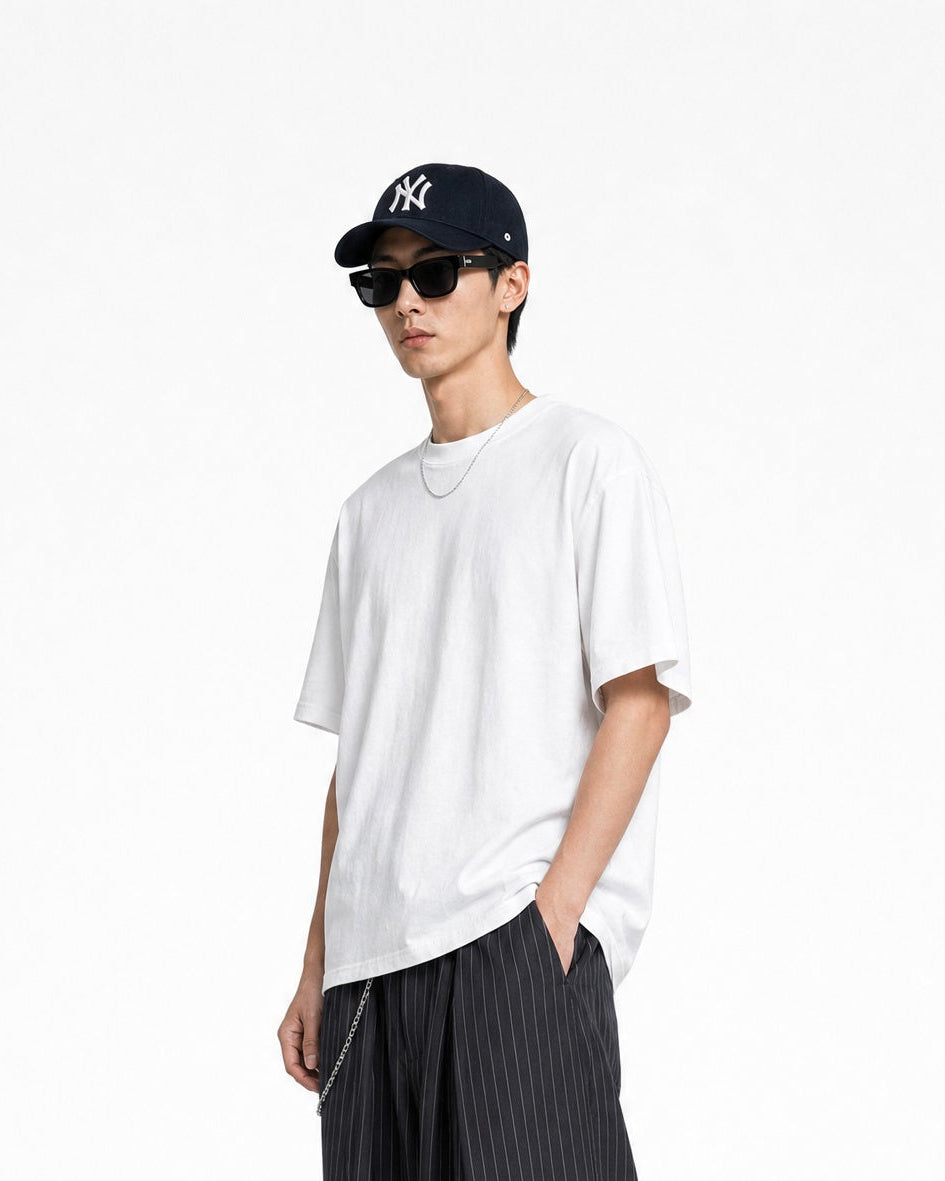 Red Thread Everyday heavyweight tee in white, worn by a male model