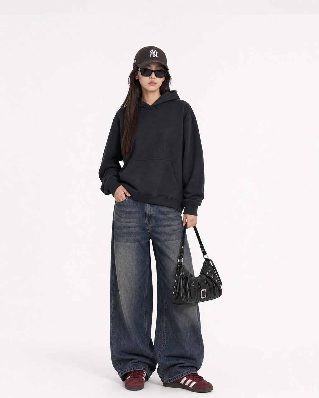 Red Thread Everyday hoodie in black, worn by a female model