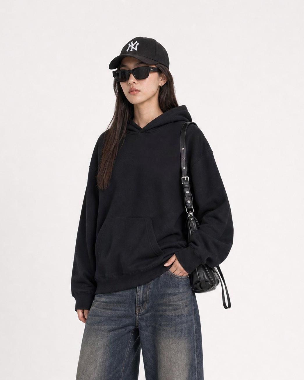 Red Thread Everyday hoodie in black, worn by a female model