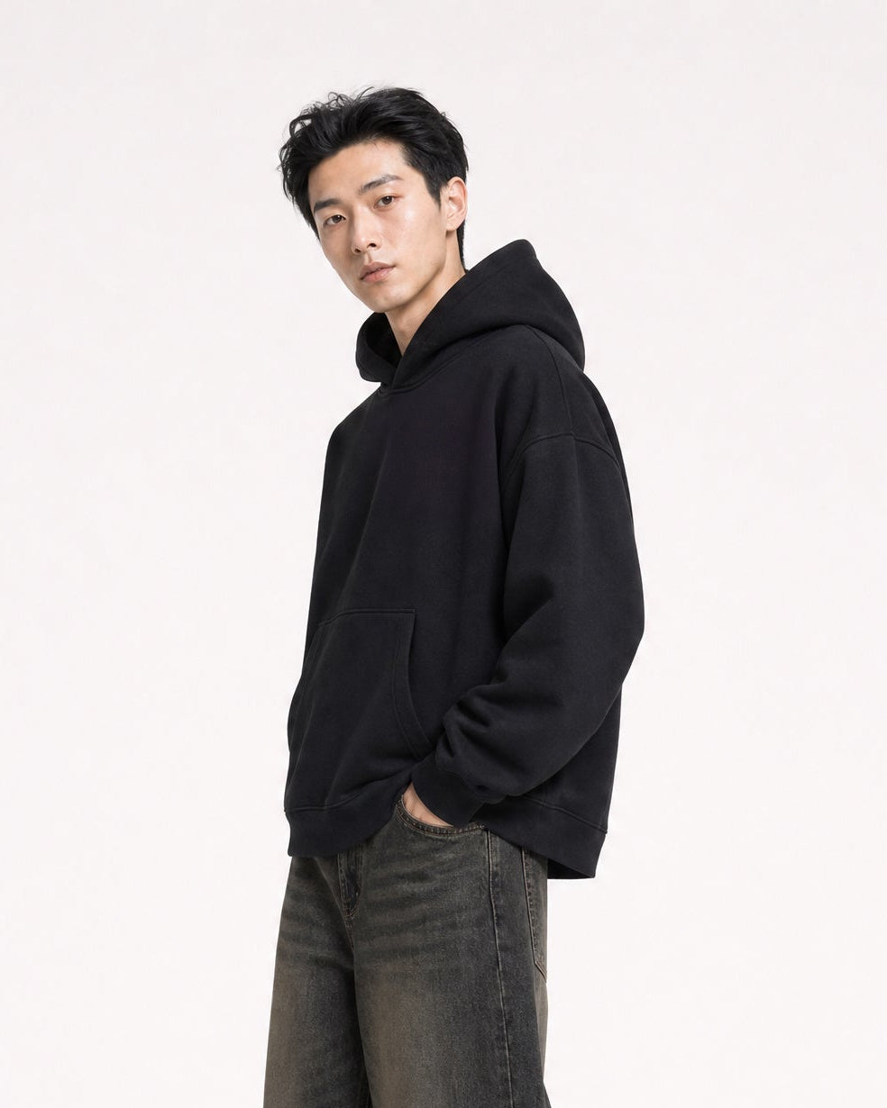 Red Thread Everyday hoodie in black, worn by a male model