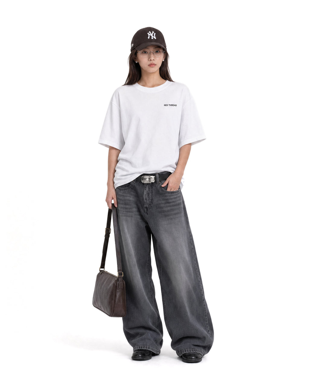Red Thread Raised Right heavyweight tee in white, worn by a female model