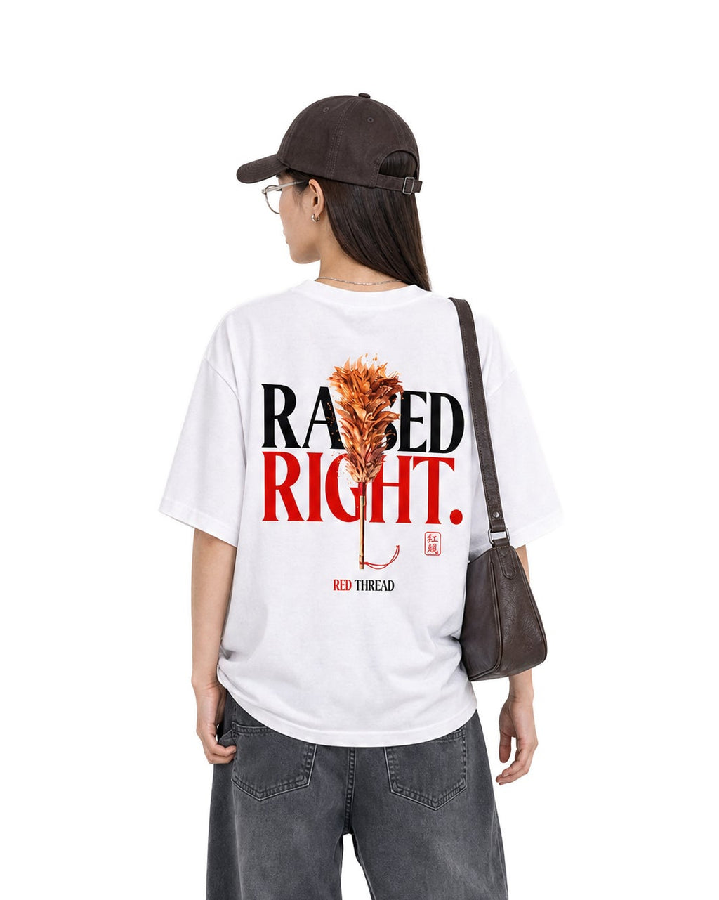 Red Thread Raised Right heavyweight tee in white, worn by a female model