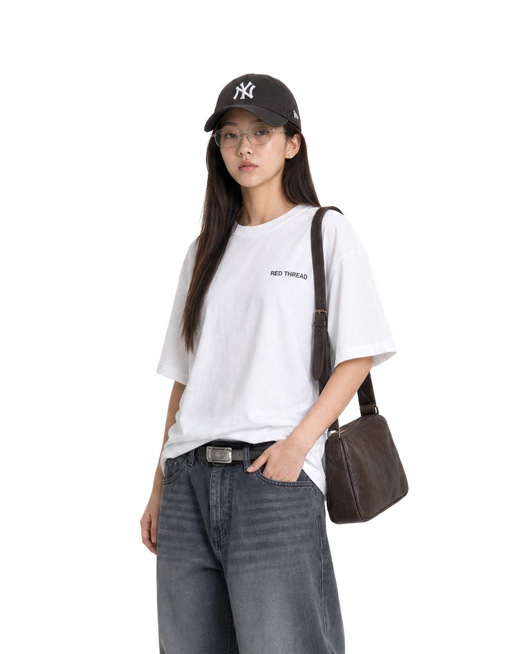 Red Thread Raised Right heavyweight tee in white, worn by a female model