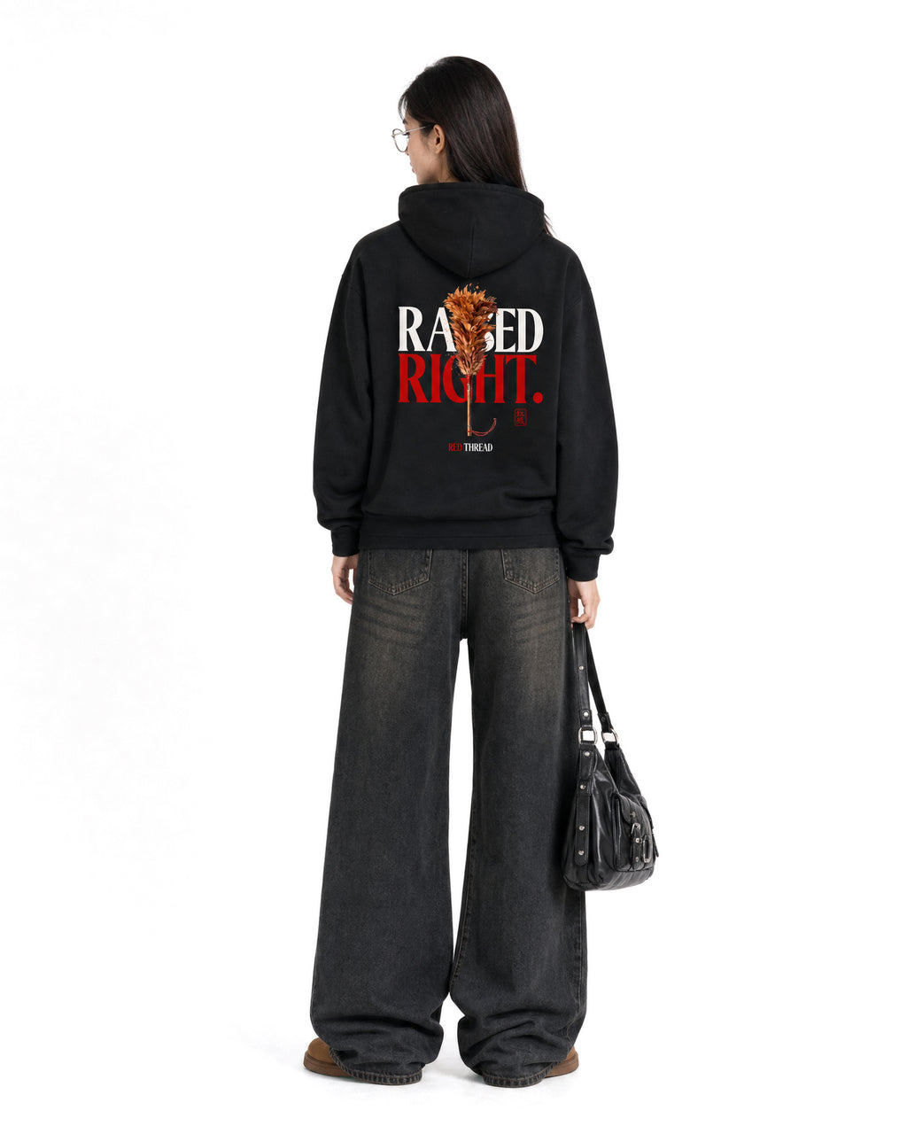 Red Thread Raised Right hoodie in black, worn by a female model