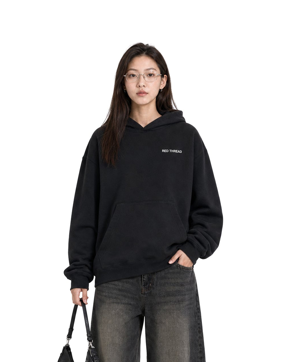 Red Thread Raised Right hoodie in black, worn by a female model