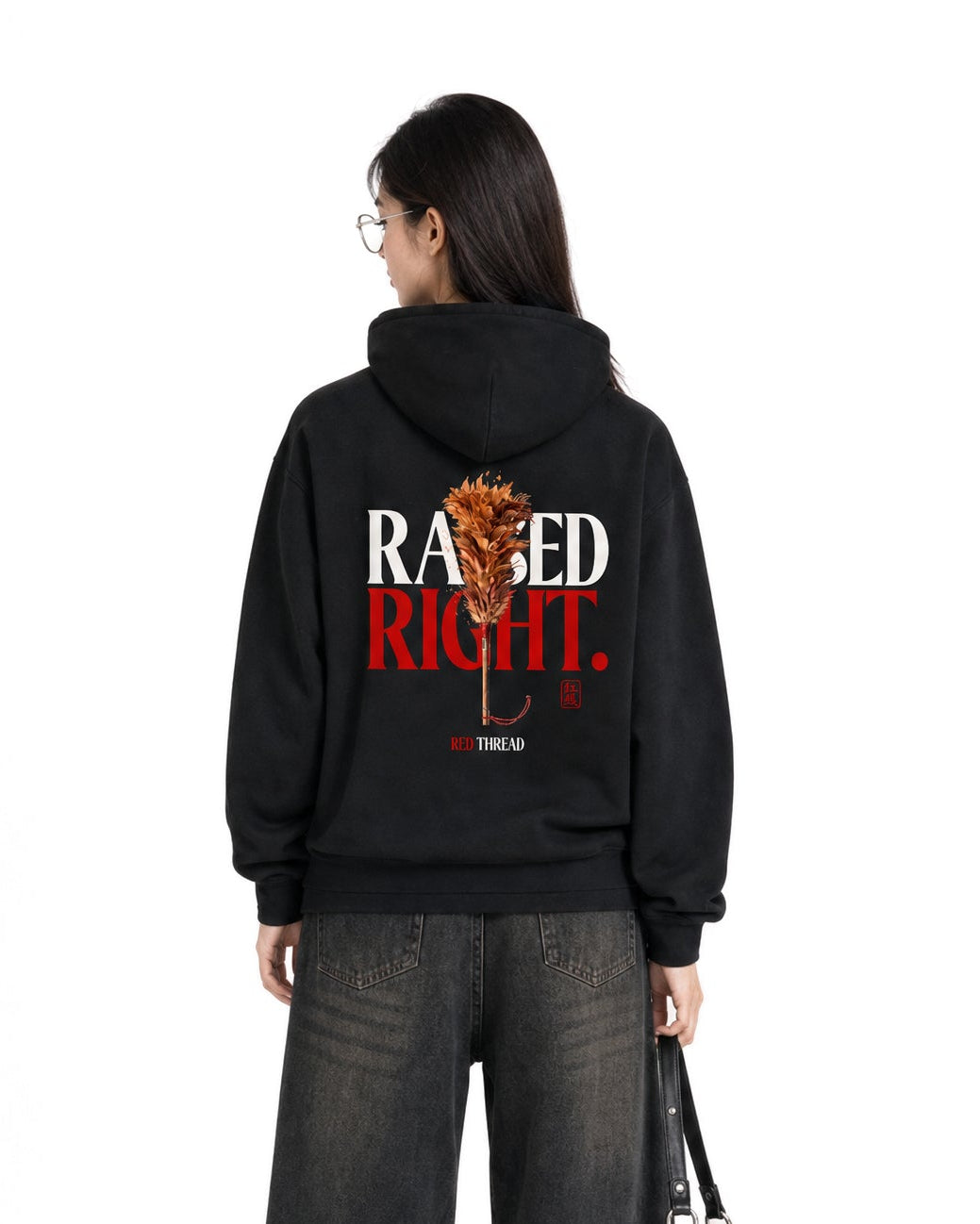 Red Thread Raised Right hoodie in black, worn by a female model