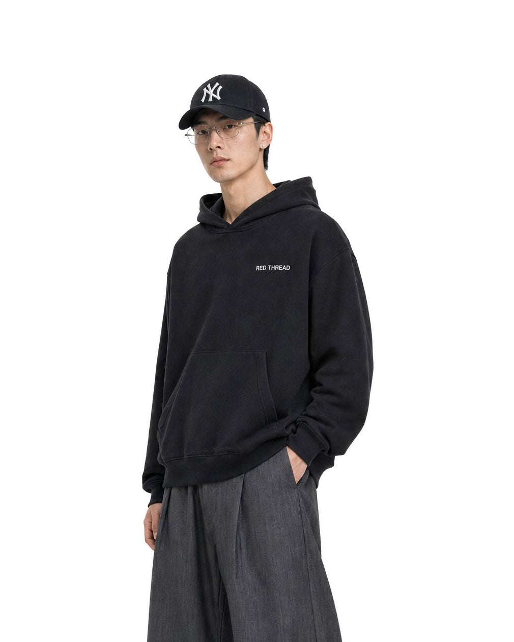 Red Thread Raised Right hoodie in black, worn by a male model