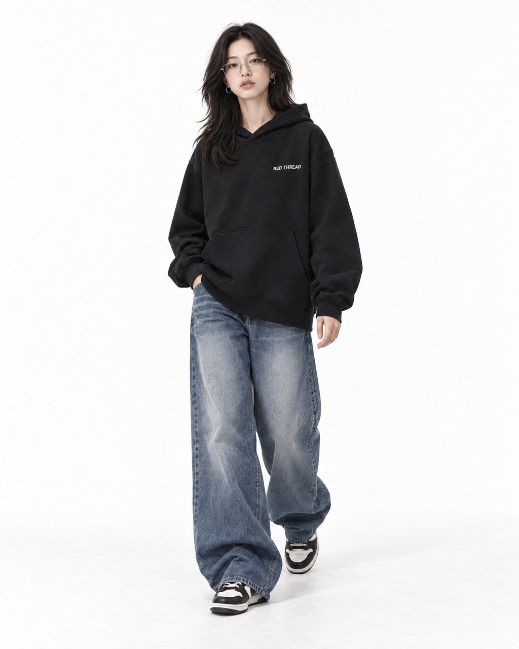 Red Thread Two Tone hoodie in black, worn by a female model