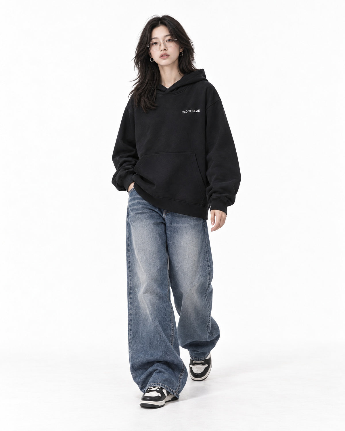 Red Thread Two Tone hoodie in black, worn by a female model